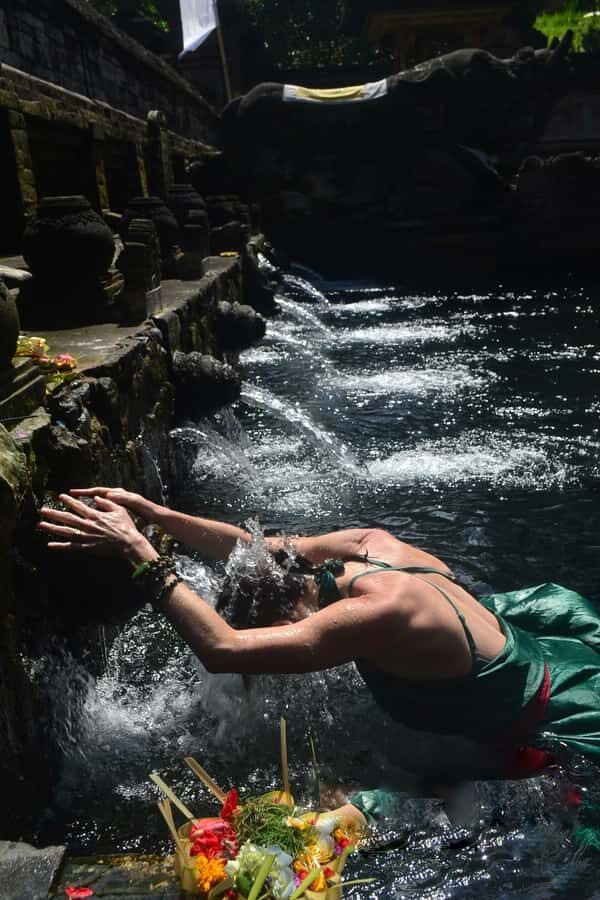 Ubud: Rice Terraces, Water Temple, & Waterfalls Private Tour - Kanto Lampo Waterfall: 15 meters, photos, and a river swim