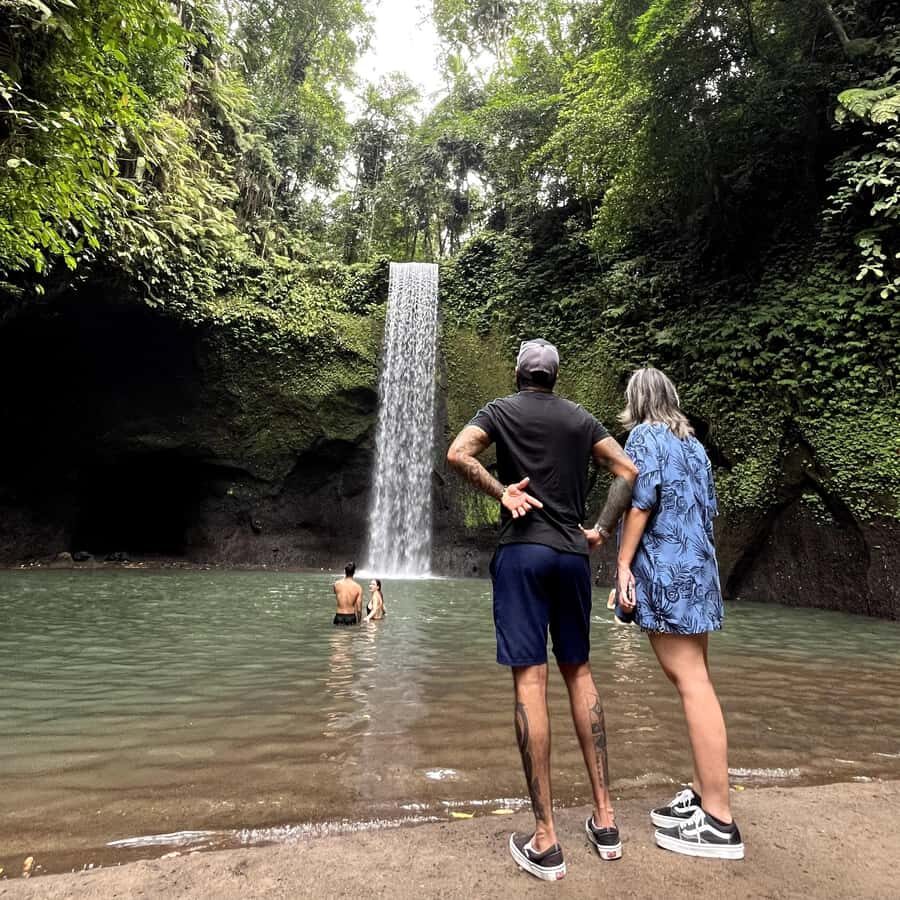 Ubud: Rice Terraces, Water Temple, & Waterfalls Private Tour - Tirta Empul Temple: holy spring water purification, explained
