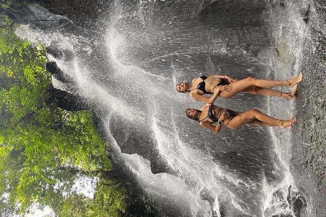 Ubud Surounding Tour - Kanto Lampo Waterfall: swim time and photo-friendly rock
