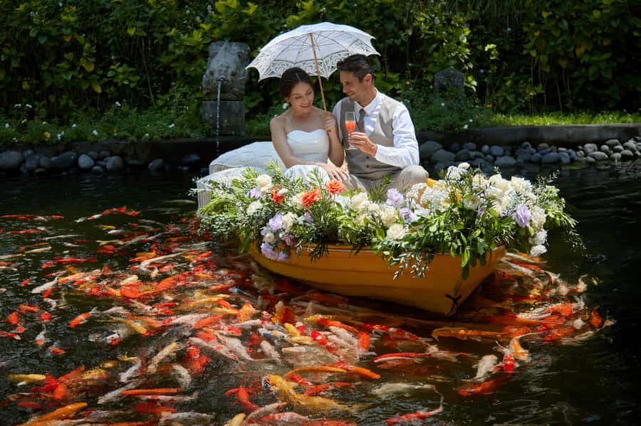 Ubud: The Original Koi Fish Yellow Boat Photo Moment - Kamandalu Ubud: where the koi boat moment starts