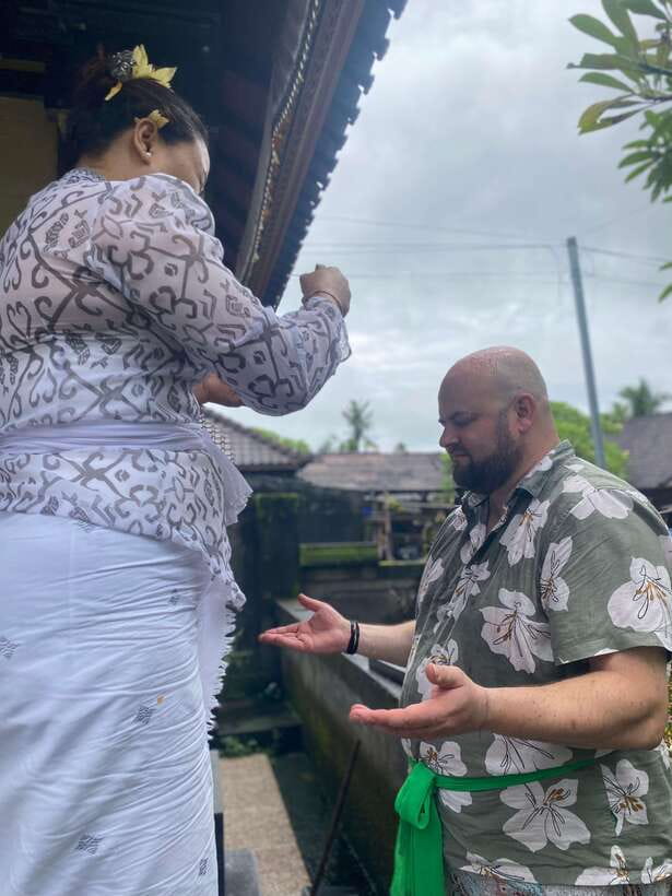 Ubud: Traditional Healing with White Lotus Blessing - Holy water and young coconut: the simple blessing that starts the cleansing