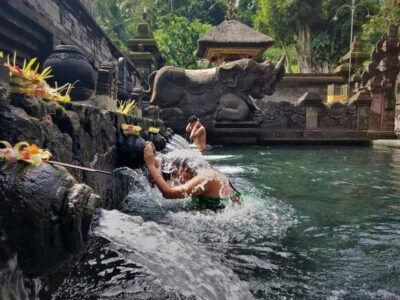 Ubud: Waterfalls, Temple, and Rice Terrace Private Day Tour - Kanto Lampo Waterfall: stairs, spray, and quick photo wins