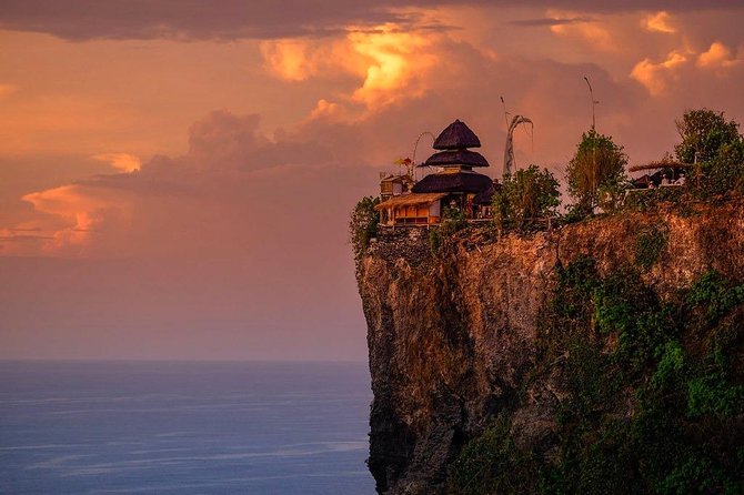 Uluwatu Temple & Kecak Fire Dance Show (Include All Tickets) - Cliffside Uluwatu Temple with monkeys and a sarong