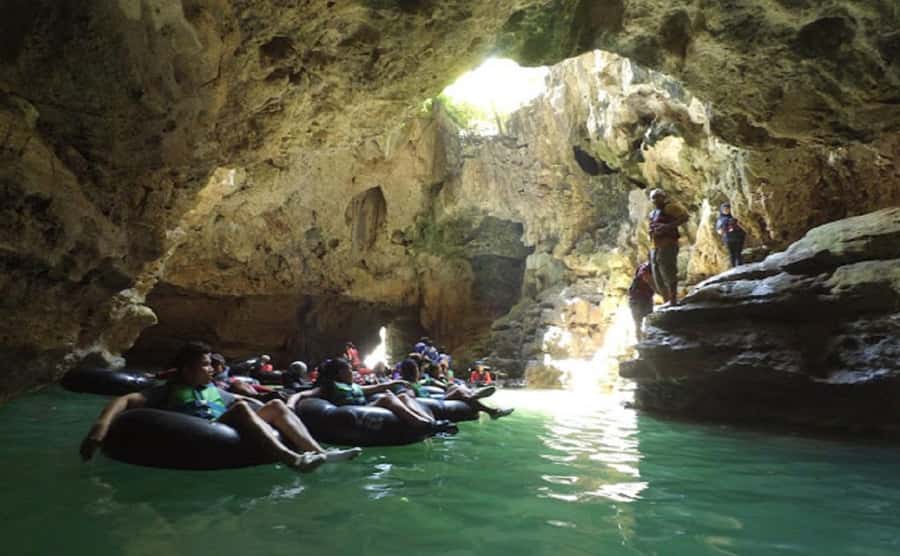 Yogyakarta: Explore Pindul Cave, Oyo River & Timang Beach - Timang Beach: jeep-and-gondola views over rocky islands